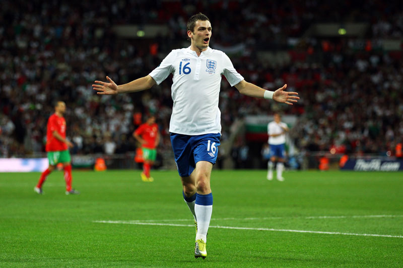 Adam Johnson celebrates his first goal for England.